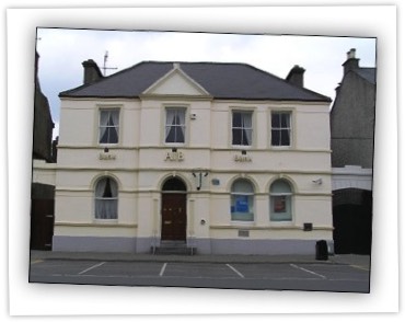 Detached four-bay two-storey bank, built c. 1880