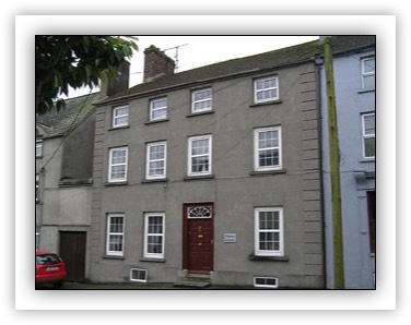 End-of-terrace four-bay three-storey house over half-basement, built c. 1770