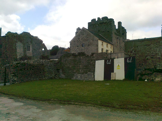 Showing outer face of wall, breach in centre and wastern end of wall at Watergate pre works